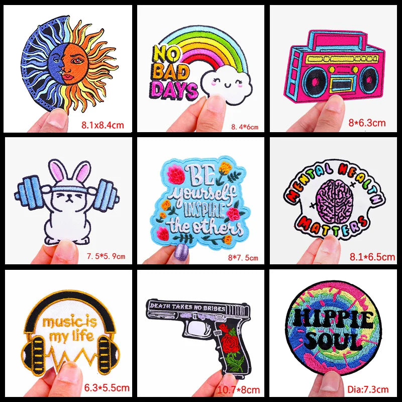 Collection of colorful stickers with various designs held by fingers, showing dimensions.