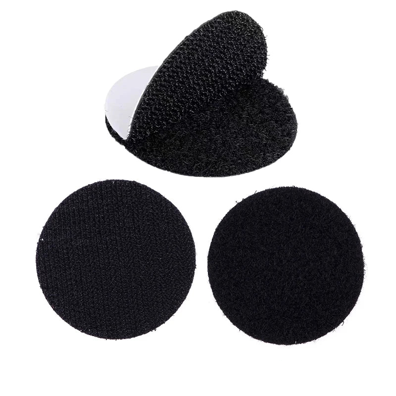 Black Velcro padding circular on a white background