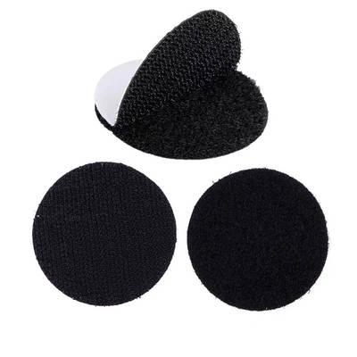 Black Velcro padding circular on a white background