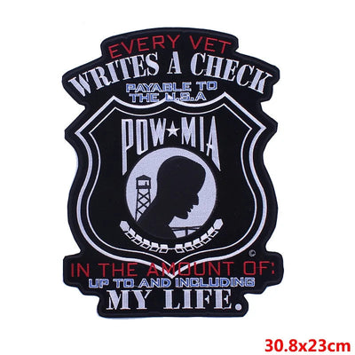 Patch with POW/MIA emblem and text on a white background