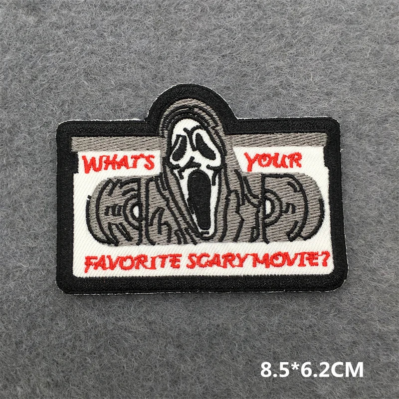 Embroidered patch with 'What's Your Favorite Scary Movie?' text and a scream design on a gray background.