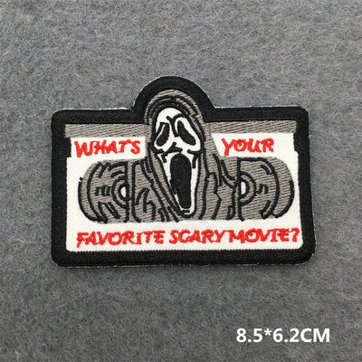 Embroidered patch with 'What's Your Favorite Scary Movie?' text and a scream design on a gray background.
