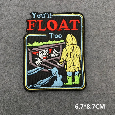Embroidered patch with a character in a yellow raincoat and text on a gray background