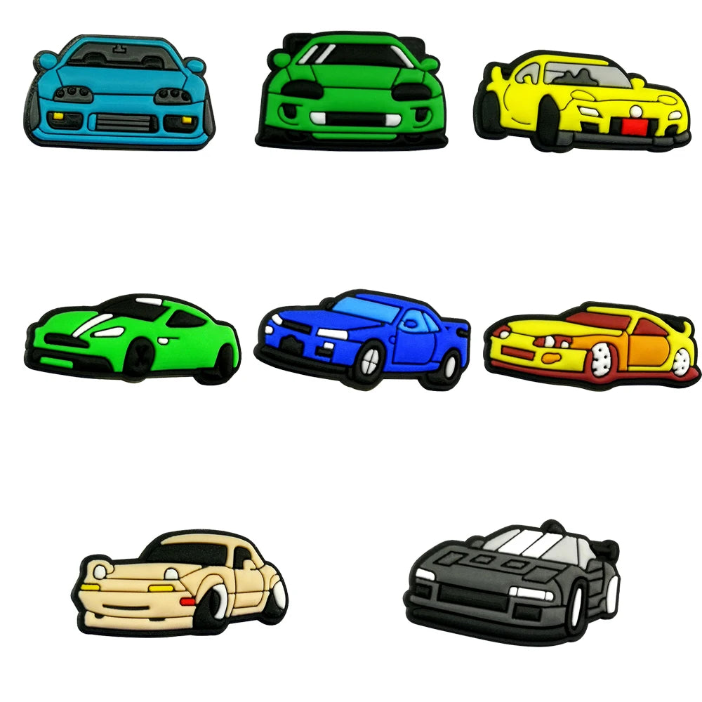 Set of colorful toy cars shoe charms on a white background