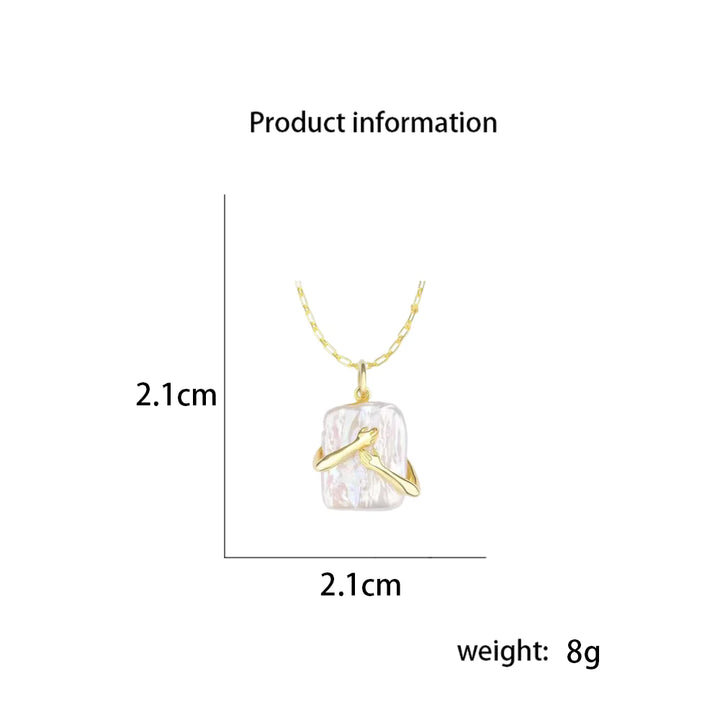 Gold necklace with a clear pendant on a white background, showing dimensions and weight.