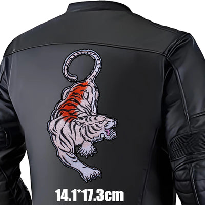 Black leather jacket with a tiger emblem on the back, size indicated.