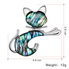 Cat-shaped brooch with abalone shell inlay and measurements on a white background