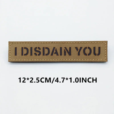 Rectangular patch with 'I DISDAIN YOU' text on a white background