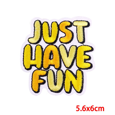 Yellow patch with 'JUST HAVE FUN' text on a white background