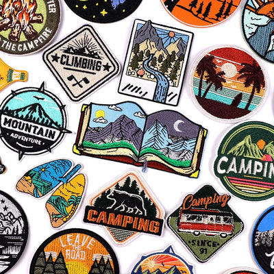 Collection of camping-themed stickers on a white background