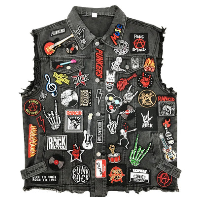 Black denim vest with various patches on a white background