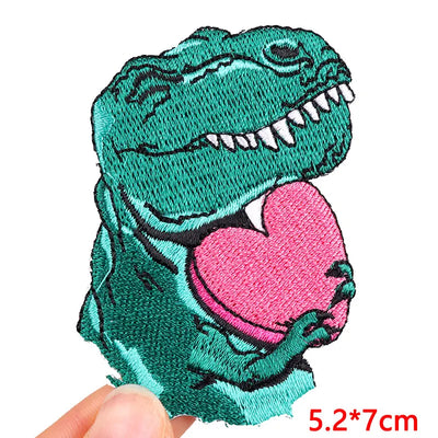 Dinosaur patch with a pink heart held by a hand, size 5.2*7cm