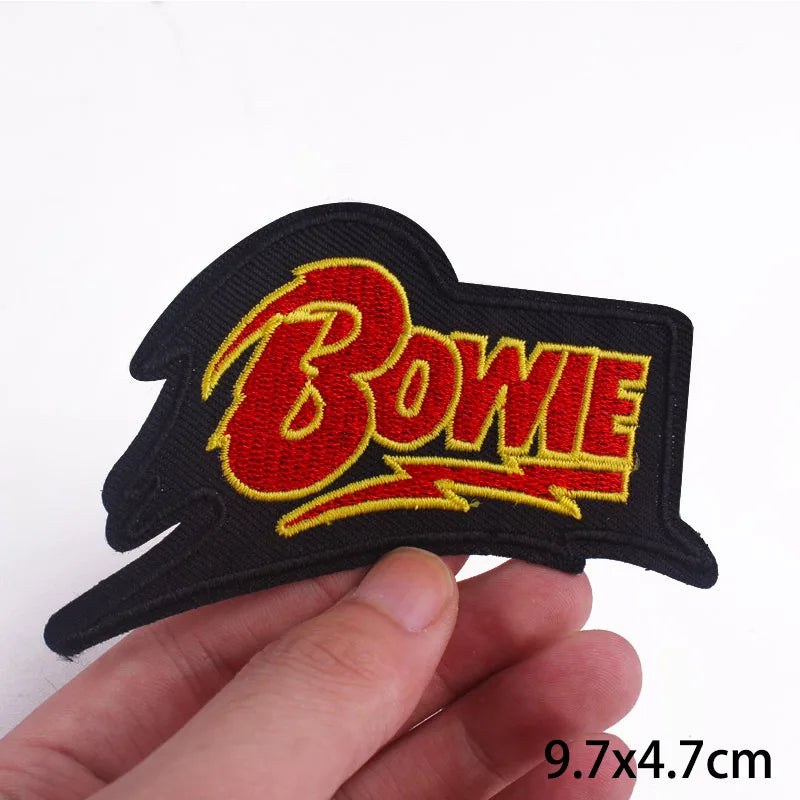 Red and yellow Bowie embroidered iron on patch with glam rock lightning style design 9.7x4.7cm