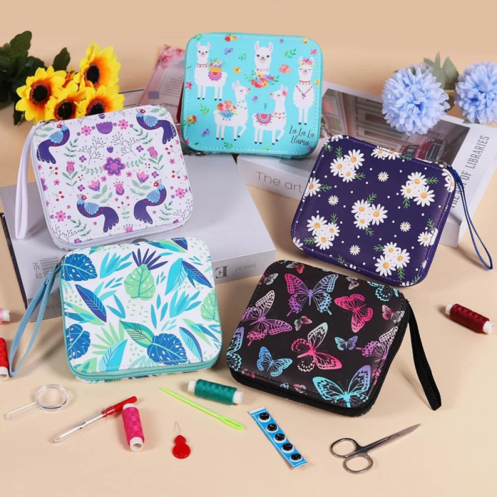 Colorful patterned portable sewing kits cases on a table with sewing supplies.