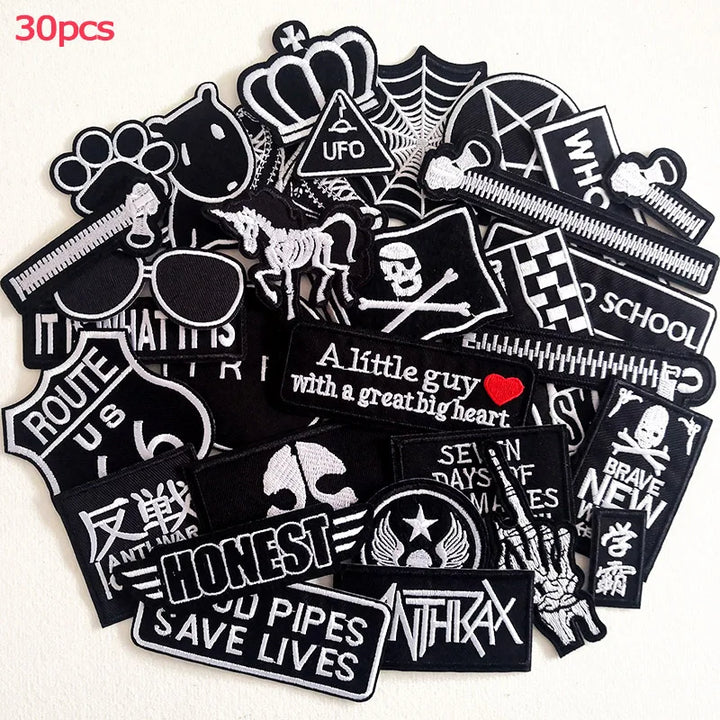 Collection of various black and white stickers on a white background