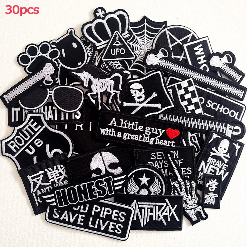 Collection of various black and white stickers on a white background