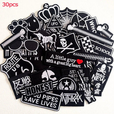 Collection of various black and white stickers on a white background