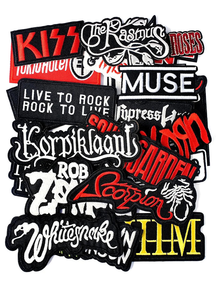 Collection of music band patches with various designs and text on a white background