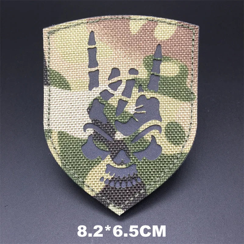 Camouflage patch with skull design on a dark background