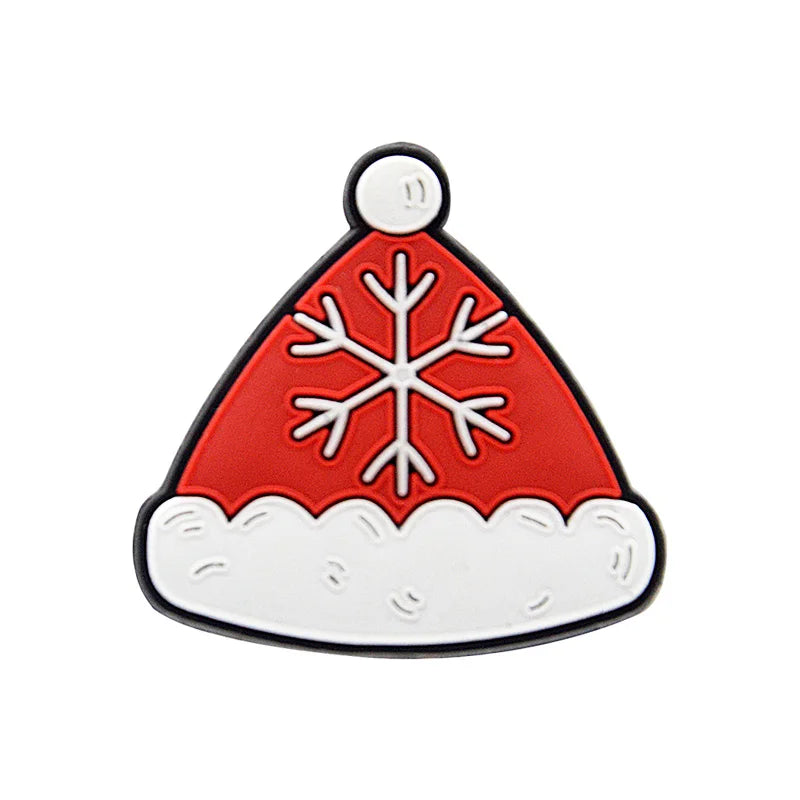 Shoe charm ornament of Red Santa hat-shaped keychain with a white snowflake design on a white background
