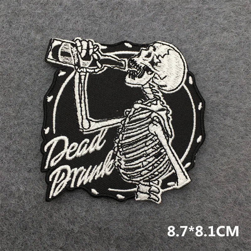 Skeleton patch drinking a bottle with &