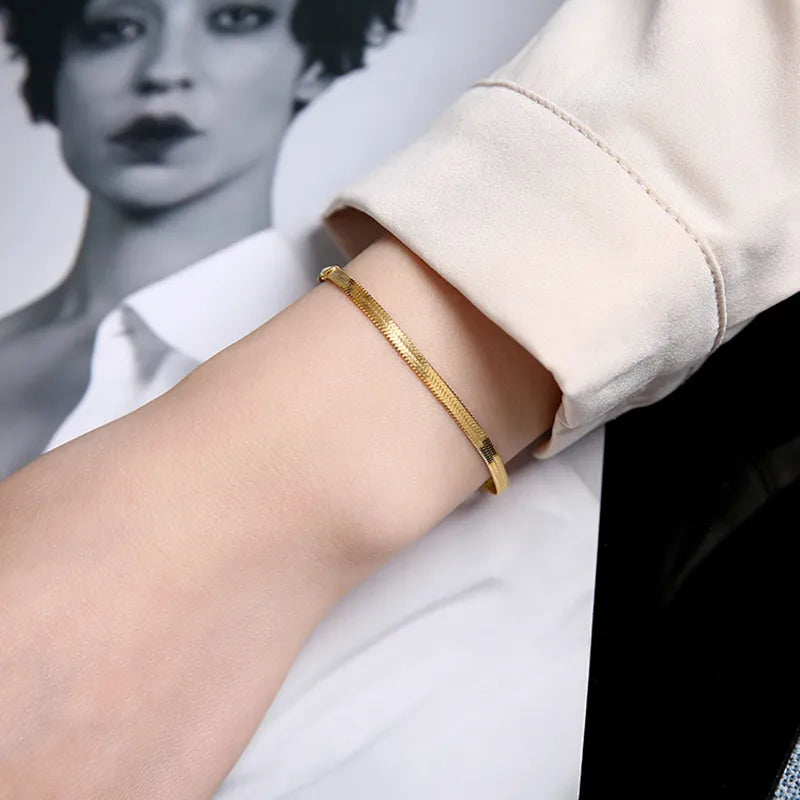 Gold bracelet on a person&
