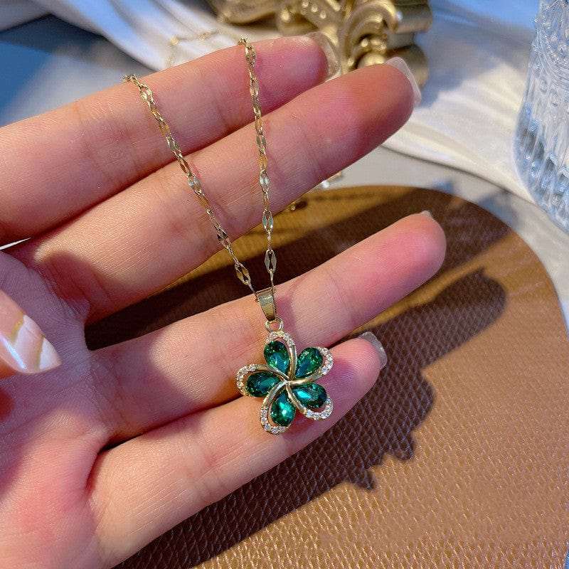a woman holding in hand  H222 Antique Flower necklace for women