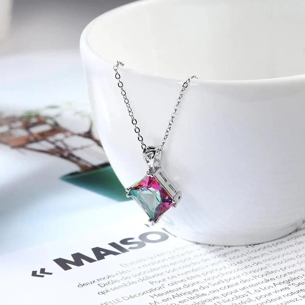 Valentine's Day Seven-Stone Stainless Steel Chain Necklacehanging on a whit cup