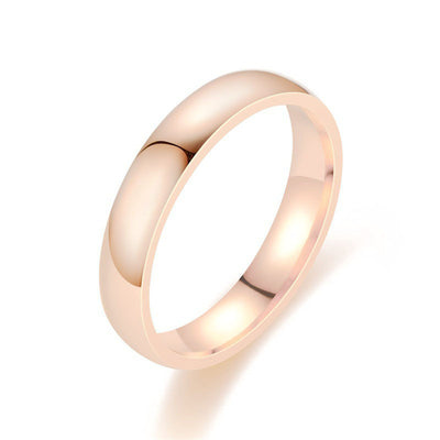 Rose gold ring on a white background