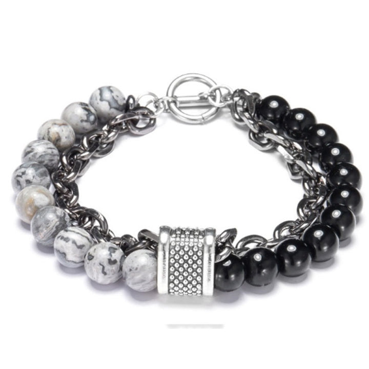 Multistrand bracelet with beads and a clasp on a white background