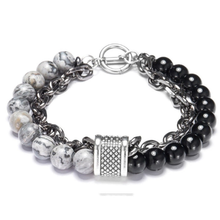 Multistrand bracelet with beads and a clasp on a white background