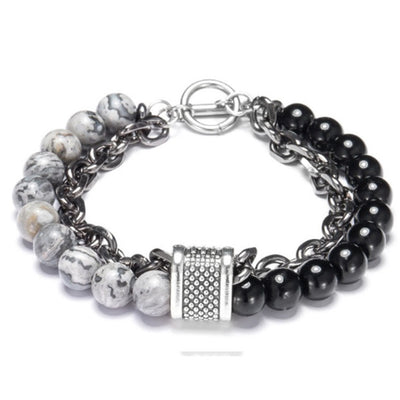Multistrand bracelet with beads and a clasp on a white background