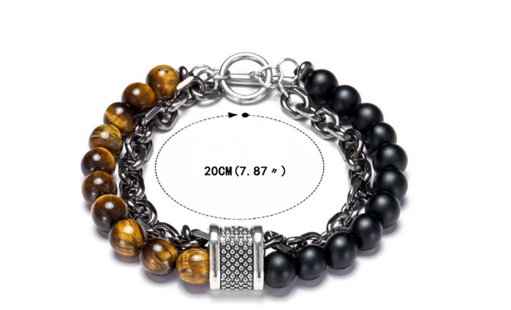 Bracelet with black and brown beads on a white background