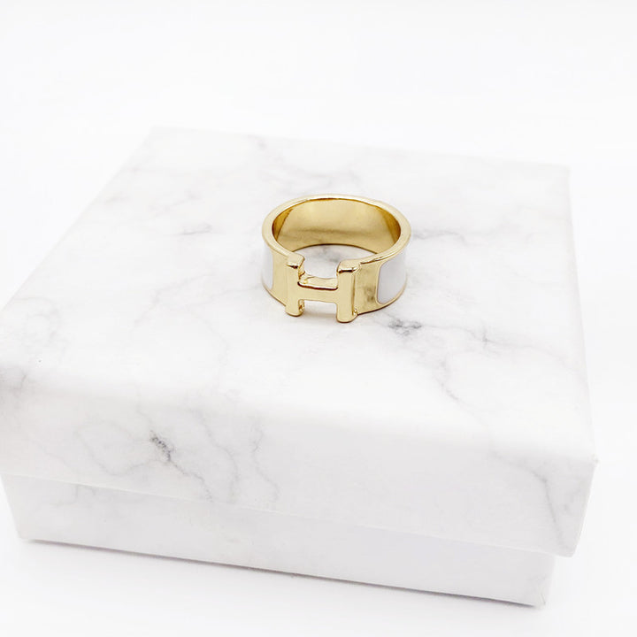 Gold ring on a marble surface