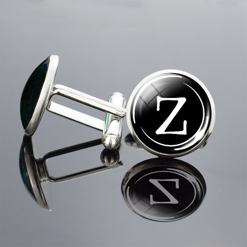 Cufflinks with a letter &