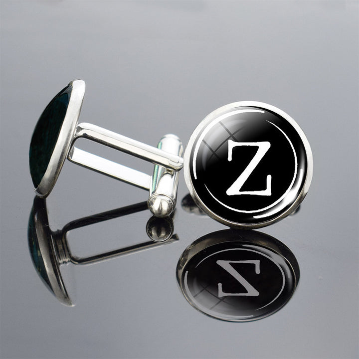 Cufflinks with a letter &