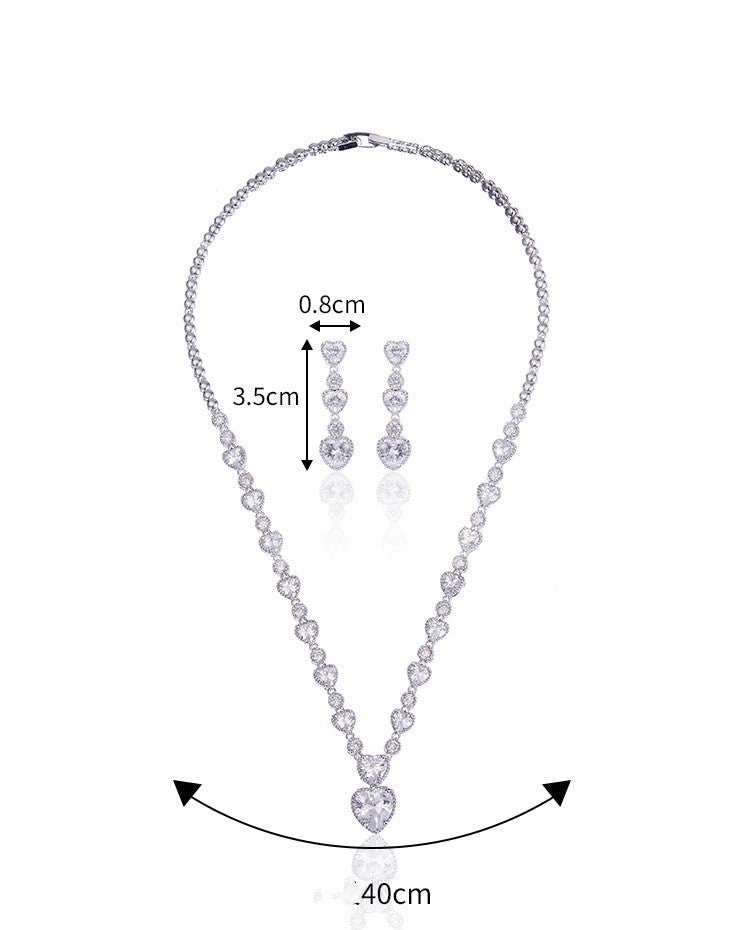 Jewelry set with necklace and earrings, showing dimensions on a white background