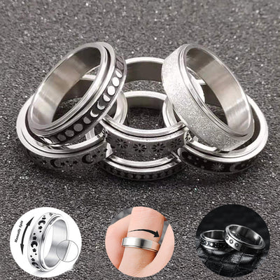 Set of metallic rings with different designs on a dark surface and inserts of some samples
