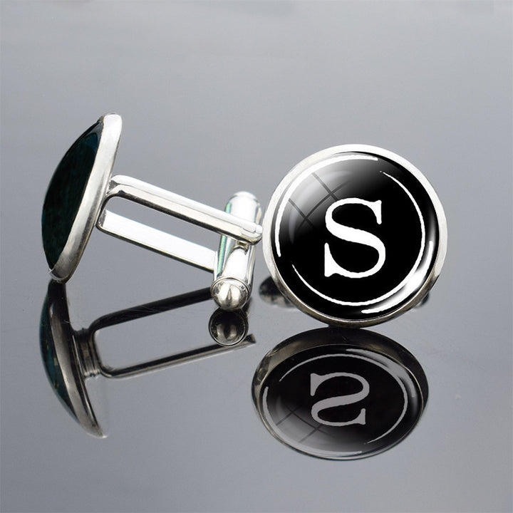 Cufflinks with a letter &