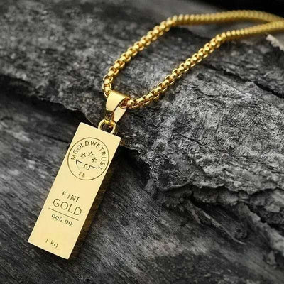 Gold Bar Hip-Hop Necklace Pendant on a grey wood