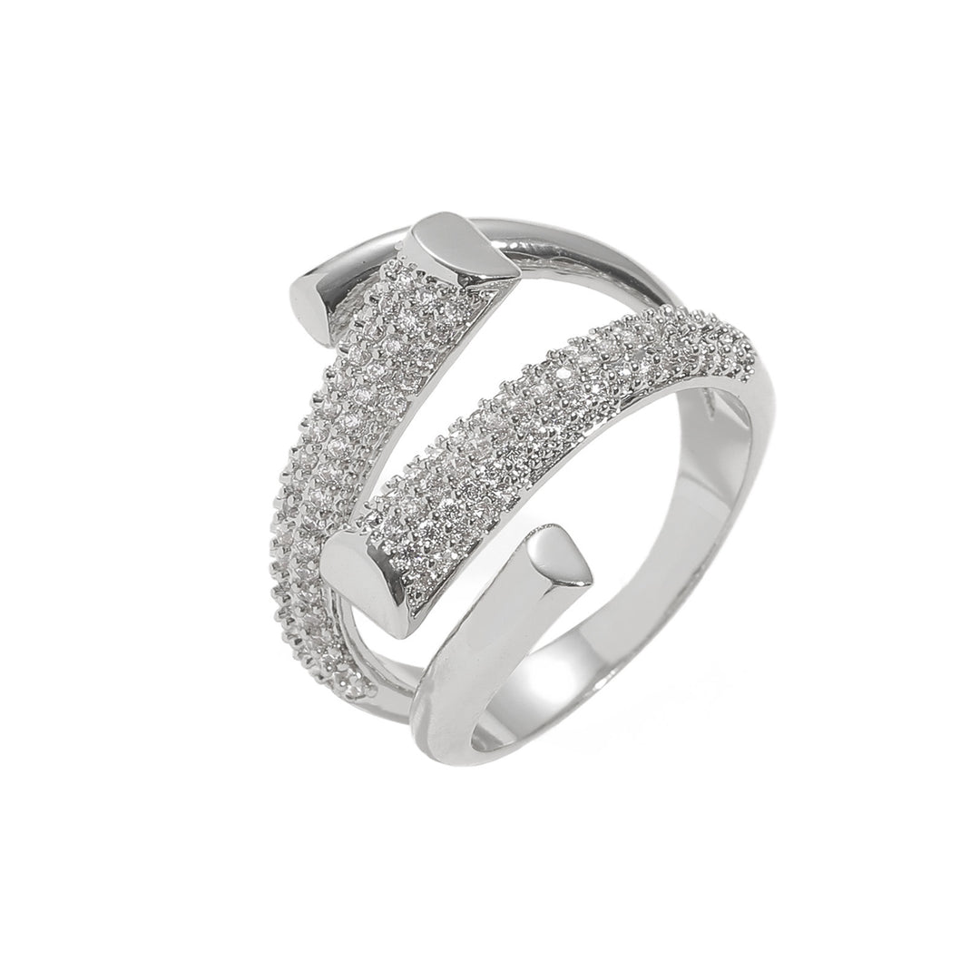 Silver ring with diamond-like stones on a white background
