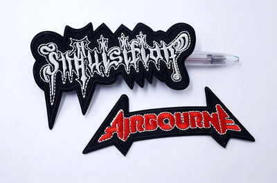 Two metal-themed patches with 'Suffocation' and 'Airbourne' logos on a white background.