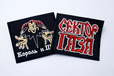 Two patches with different designs on a white background
