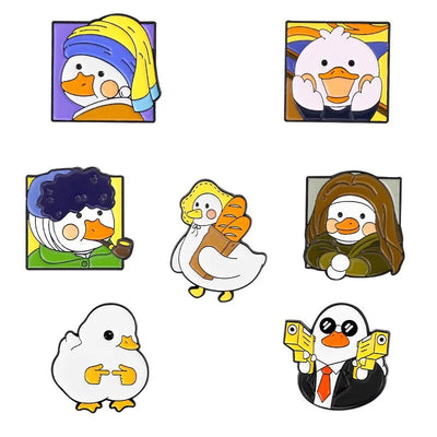 Set of cartoon duck pins with various outfits on a white background