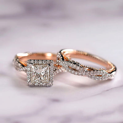 Rose gold ring with diamond and a  band with diamond on a soft purple background