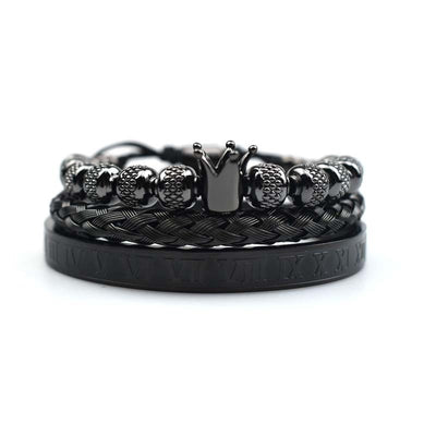 Black braided bracelet with metal beads on a white background