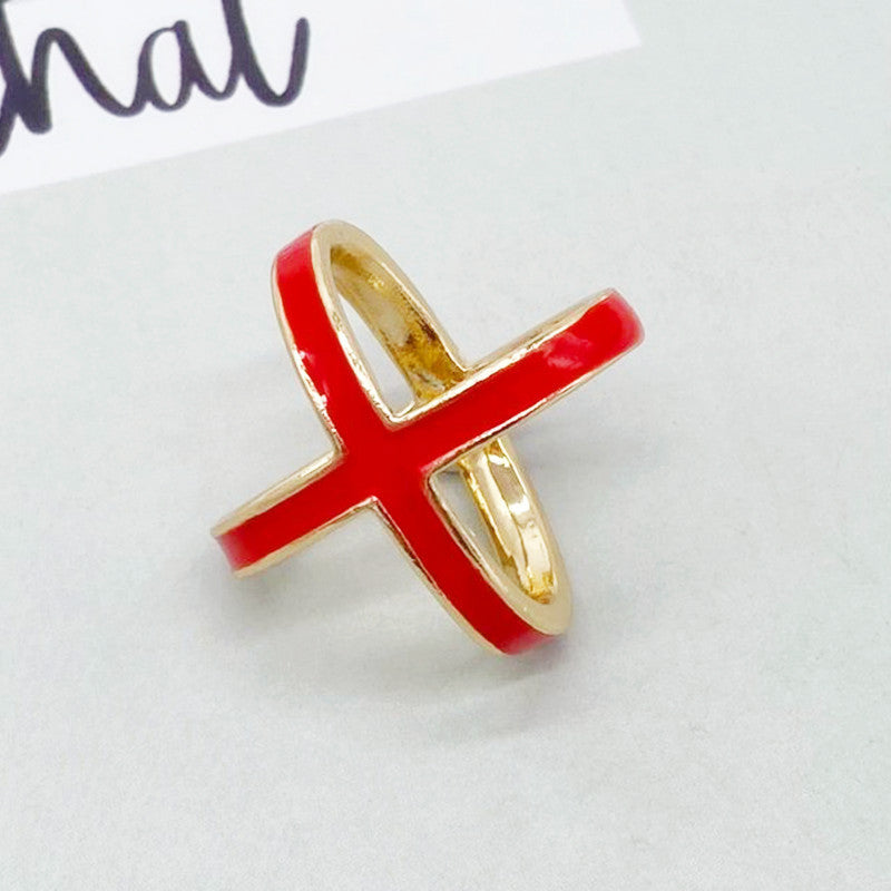 Red and gold ring on a light gray background