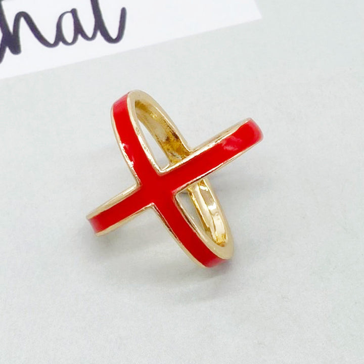 Red and gold ring on a light gray background