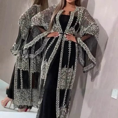 a woman wearing Black / L Bronzing sexy long skirt shawl front view