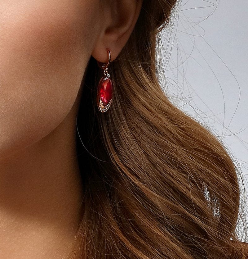 a women wearing the earrings
